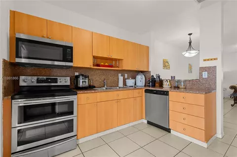 Kitchen - 317 E 3rd St #201, Hialeah, FL 33010 photo 3 of 4