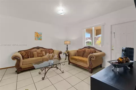 Living - 317 E 3rd St #201, Hialeah, FL 33010 photo 2 of 2