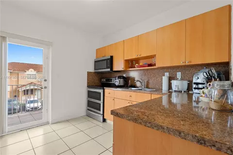 Kitchen - 317 E 3rd St #201, Hialeah, FL 33010 photo 2 of 4