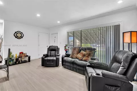 Living - 340 W 55th St, Hialeah, FL 33012 photo 1 of 3