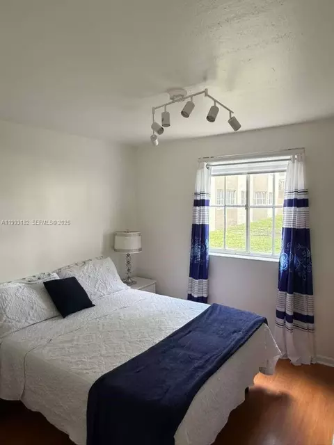 Bedroom - 6115 NW 186th St #104, Hialeah, FL 33015 photo 2 of 2