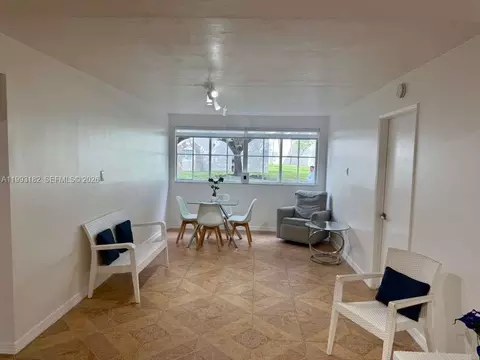 Living - 6115 NW 186th St #104, Hialeah, FL 33015 photo 1 of 1