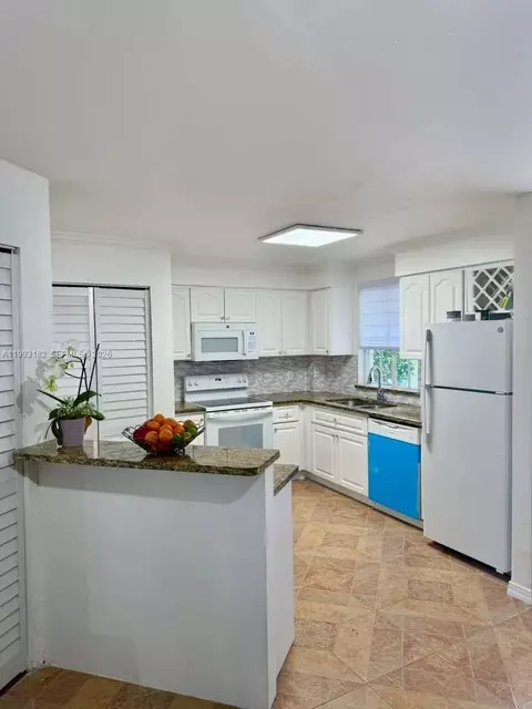 Kitchen - 6115 NW 186th St #104, Hialeah, FL 33015 photo 1 of 1