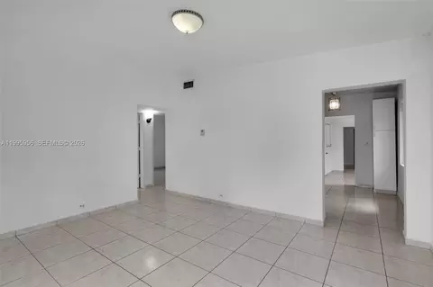 Living - 670 E 45th St, Hialeah, FL 33013 photo 3 of 7