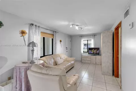 Living - 670 E 45th St, Hialeah, FL 33013 photo 6 of 7