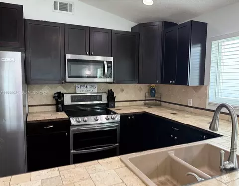 Kitchen - 3091 Lighthouse Pl, Margate, FL 33063 photo 1 of 2