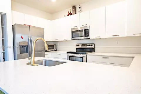 Kitchen - 12448 NW 23rd Ct, Miami, FL 33167 photo 4 of 5
