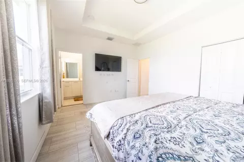 Bedroom - 12448 NW 23rd Ct, Miami, FL 33167 photo 6 of 8