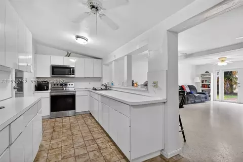Kitchen - 733 W 33rd St, Hialeah, FL 33012 photo 2 of 2