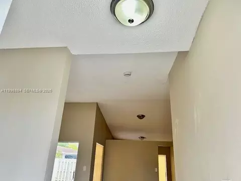 Entry Way - 19922 NW 67th Pl, Hialeah, FL 33015 photo 1 of 2