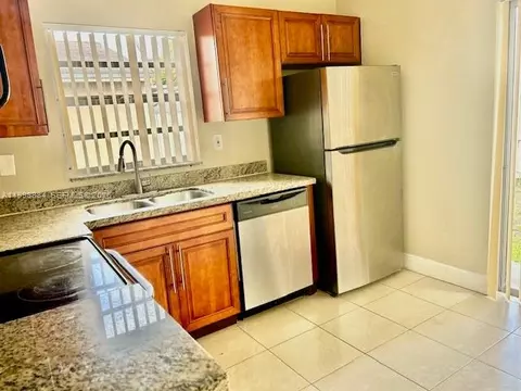 Kitchen - 19922 NW 67th Pl, Hialeah, FL 33015 photo 2 of 2