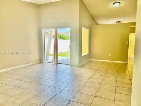 Living - 19922 NW 67th Pl, Hialeah, FL 33015 photo 1 of 2