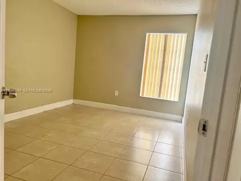 Bedroom - 19922 NW 67th Pl, Hialeah, FL 33015 photo 2 of 3