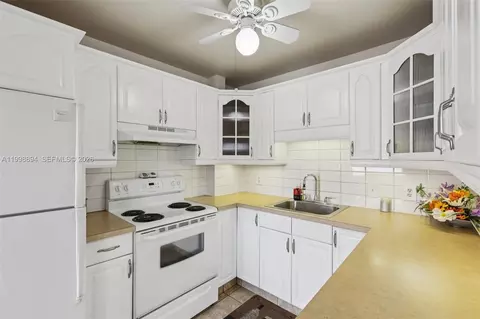 Kitchen - 22 SE 3rd Ter #18, Dania Beach, FL 33004 photo 2 of 2
