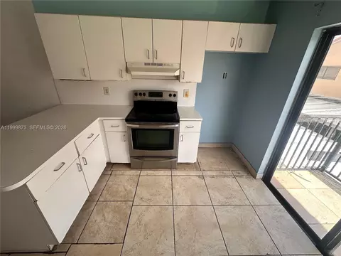 Kitchen - 7952 W 29th Way #202, Hialeah, FL 33018 photo 2 of 3