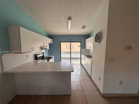 Kitchen - 7952 W 29th Way #202, Hialeah, FL 33018 photo 1 of 3
