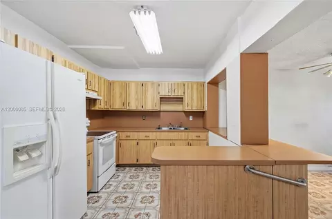 Kitchen - 490 E 45th St, Hialeah, FL 33013 photo 1 of 3