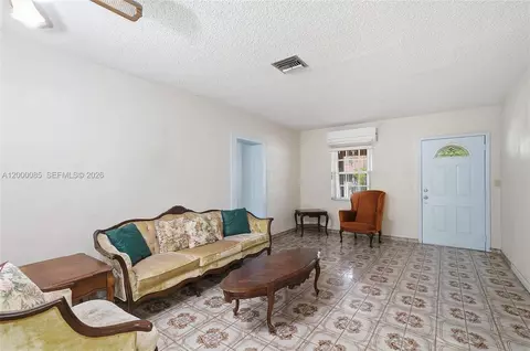 Living - 490 E 45th St, Hialeah, FL 33013 photo 3 of 6