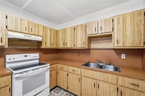 Kitchen - 490 E 45th St, Hialeah, FL 33013 photo 2 of 3