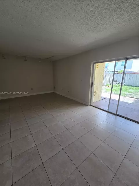 Living - 932 W 80th Pl, Hialeah, FL 33014 photo 1 of 2