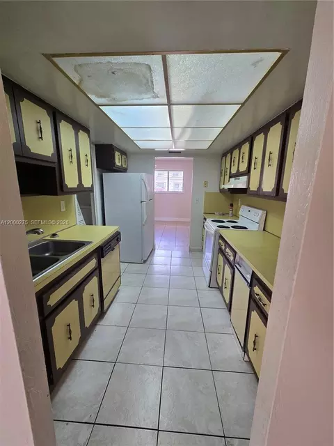 Kitchen - 932 W 80th Pl, Hialeah, FL 33014 photo 2 of 2