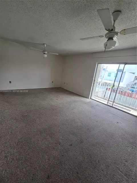 Living - 932 W 80th Pl, Hialeah, FL 33014 photo 2 of 2