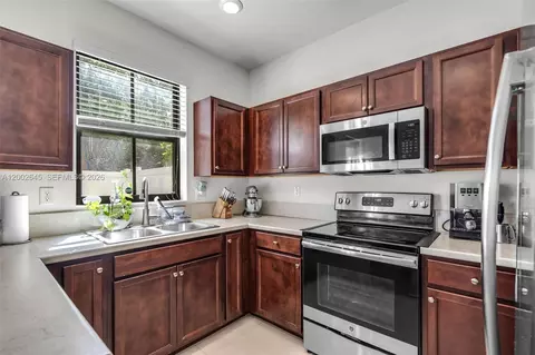 Kitchen - 10371 W 32nd Ln, Hialeah, FL 33018 photo 1 of 2