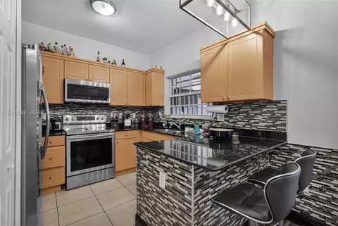 Kitchen - 1381 W 30th St, Hialeah, FL 33012 photo 2 of 3