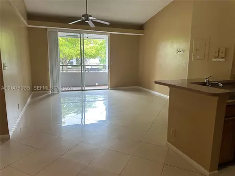 Living - 731 Lyons Rd #16203, Coconut Creek, FL 33063 photo 1 of 4
