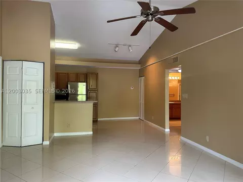 Living - 731 Lyons Rd #16203, Coconut Creek, FL 33063 photo 3 of 4