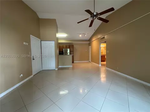 Living - 731 Lyons Rd #16203, Coconut Creek, FL 33063 photo 4 of 4