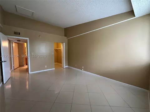 Bedroom - 731 Lyons Rd #16203, Coconut Creek, FL 33063 photo 2 of 2