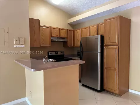 Kitchen - 731 Lyons Rd #16203, Coconut Creek, FL 33063 photo 2 of 2