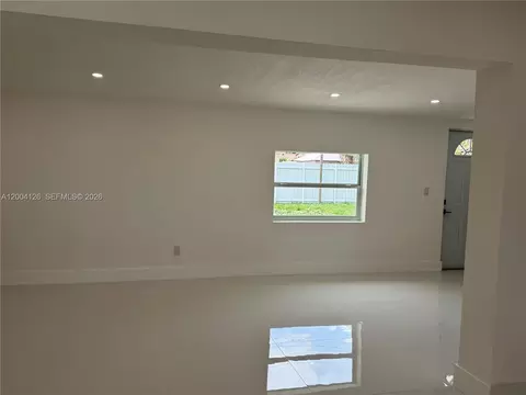 Living - 8064 W 14th Ave, Hialeah, FL 33014 photo 2 of 3