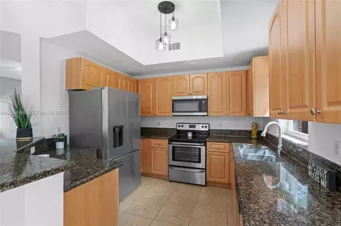 Kitchen - 22251 SW 88th Path, Cutler Bay, FL 33190 photo 1 of 3
