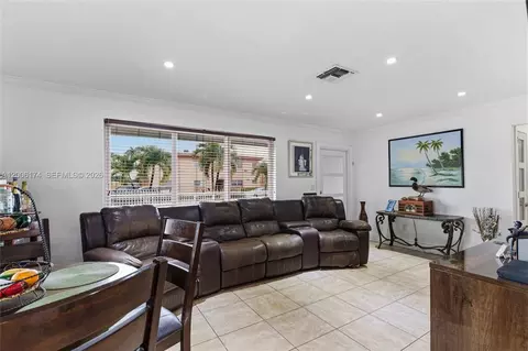 Living - 1132 W 71st St, Hialeah, FL 33014 photo 2 of 3