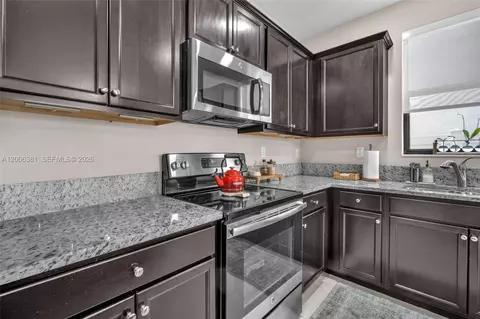 Kitchen - 3525 W 94th St, Hialeah, FL 33018 photo 5 of 6