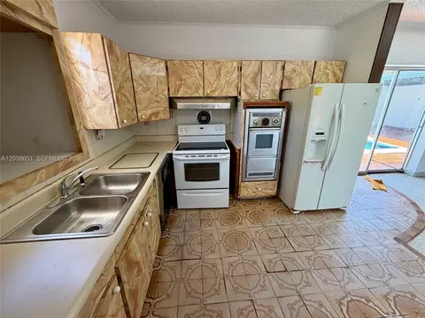 Kitchen - 5373 W 10th Ct, Hialeah, FL 33012 photo 2 of 2
