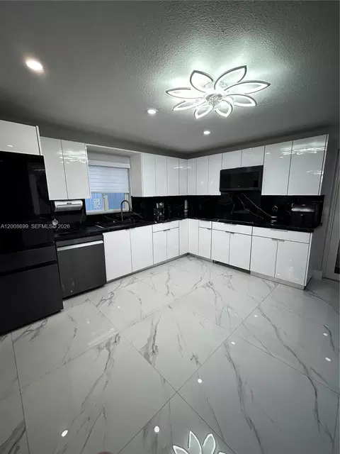 Kitchen - 367 W 33rd St, Hialeah, FL 33012 photo 1 of 3
