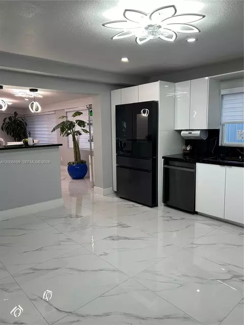 Kitchen - 367 W 33rd St, Hialeah, FL 33012 photo 2 of 3