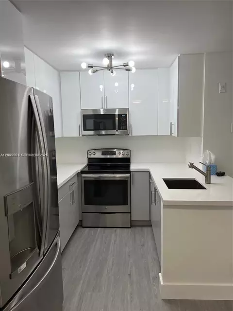 Kitchen - 931 Lyons Rd #4101, Coconut Creek, FL 33063 photo 1 of 3