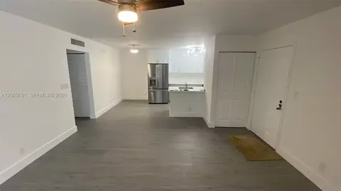 Living - 931 Lyons Rd #4101, Coconut Creek, FL 33063 photo 2 of 2