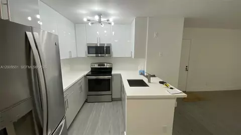 Kitchen - 931 Lyons Rd #4101, Coconut Creek, FL 33063 photo 3 of 3