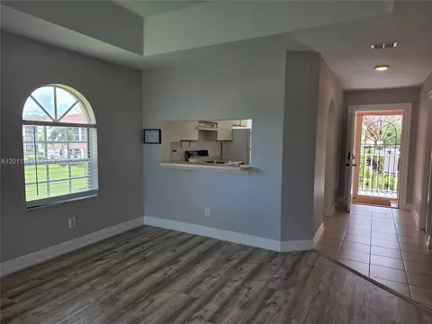 Living - 575 Augusta Blvd #8, Naples, FL 34113 photo 2 of 2