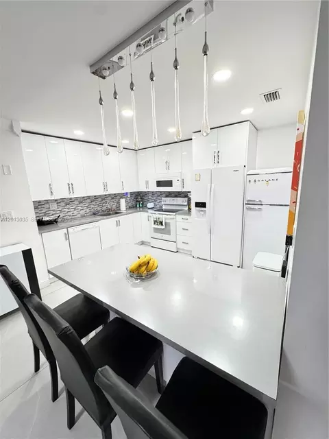 Kitchen - 7140 W 15th Ct, Hialeah, FL 33014 photo 2 of 3