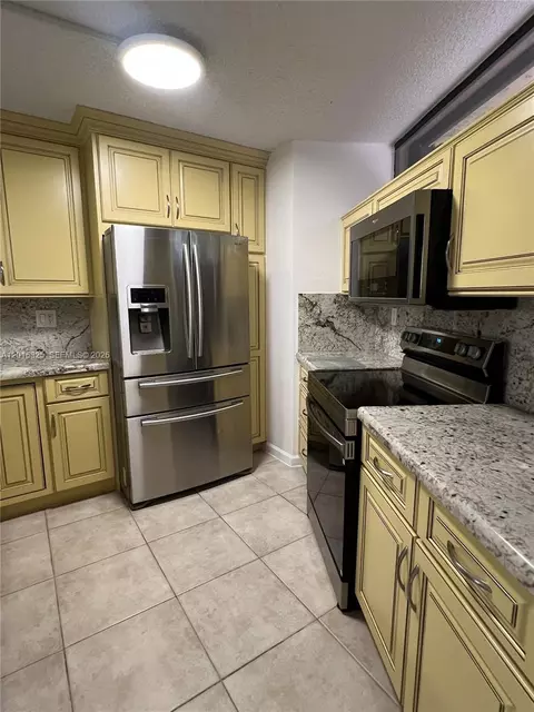 Kitchen - 8129 Severn Dr #C, Boca Raton, FL 33433 photo 2 of 2