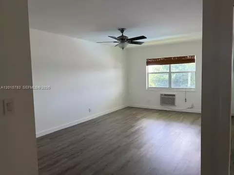Living - 1350 E Sample Rd #306, Pompano Beach, FL 33064 photo 2 of 3