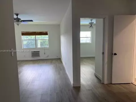 Living - 1350 E Sample Rd #306, Pompano Beach, FL 33064 photo 1 of 3