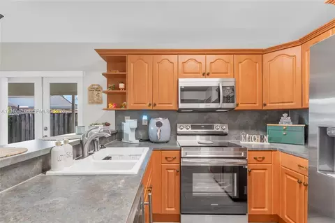 Kitchen - 8266 NW 192nd Ter, Hialeah, FL 33015 photo 3 of 3