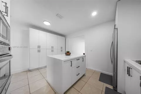 Kitchen - 661 E 7th St, Hialeah, FL 33010 photo 2 of 3